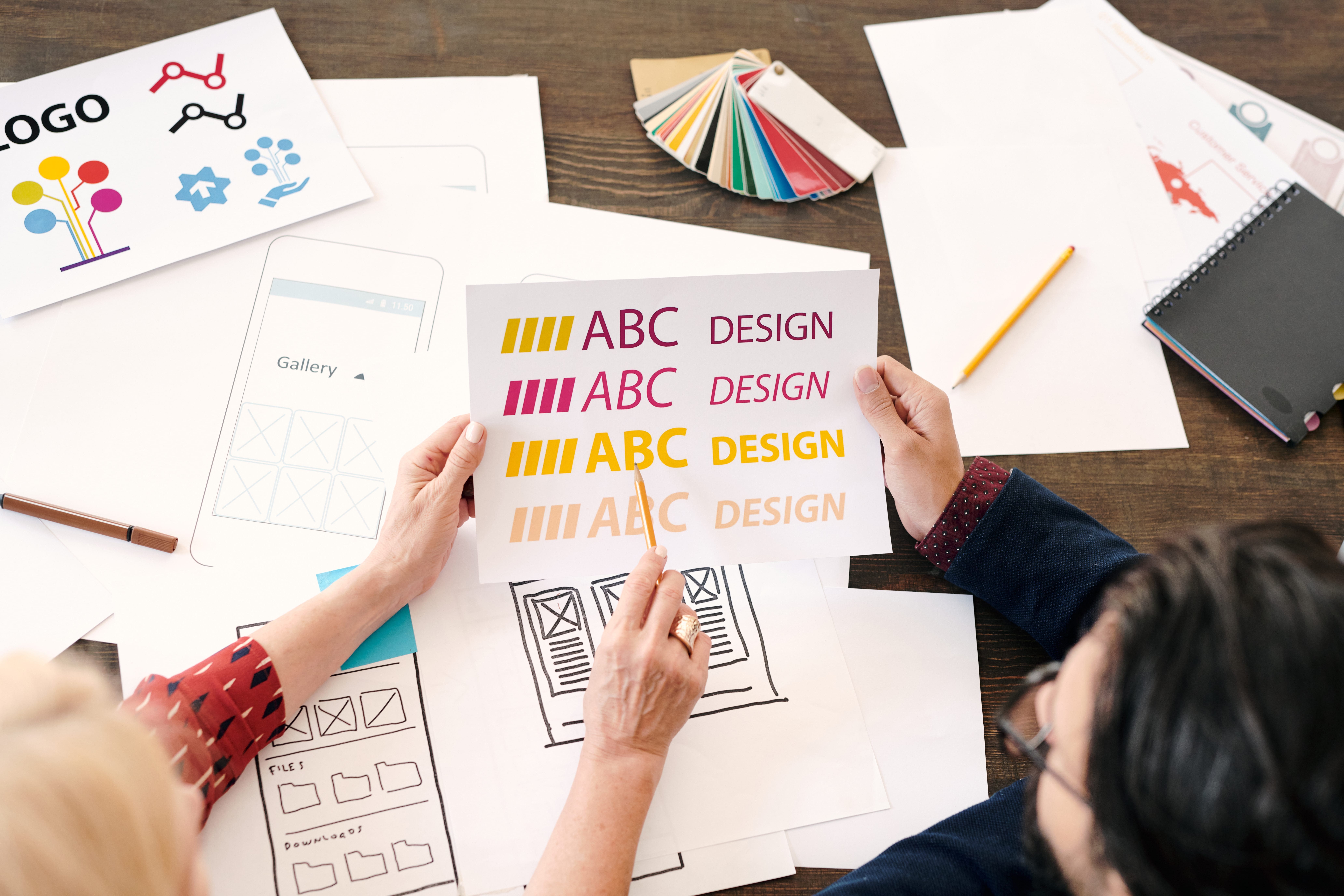 hands of mature female designer pointing at paper 2025 04 02 22 27 15 utc 2 2